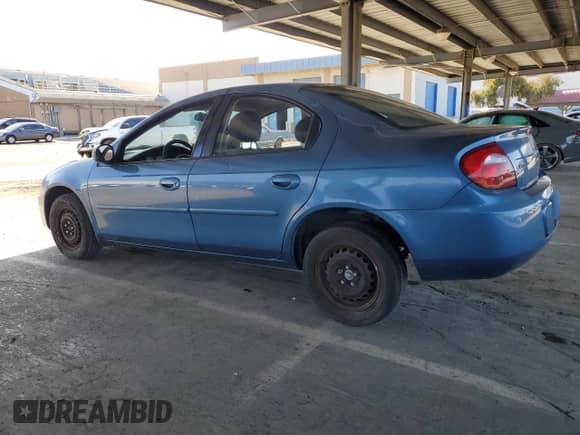 2003 Dodge Neon SXT z VIN 1B3ES56C83D164240, wystawiony jako Copart lot #51694645 z przebiegiem 169 504 mil mil oraz Szkoda całkowita • Salvage title. Historia ofert i sprzedaży dostępna na DreamBid. Obrazek 2.