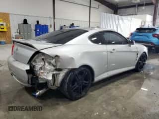 2006 Hyundai Tiburon GT z VIN KMHHN65F96U203924, wystawiony jako Copart lot #43624185 z przebiegiem 120 403 mil mil oraz Szkoda całkowita • Salvage title. Historia ofert i sprzedaży dostępna na DreamBid. Obrazek 3.