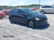 ✅ 2013 Chevrolet Sonic LS • VIN: 1G1JA6SH2D4109297 • Lot: 42523348. Listed on IAAI with 128,301 mi. Free auction sales archive from the USA and detailed vehicle history report at DreamBid. Image 1.