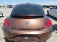 ✅ 2016 Volkswagen Beetle SE • VIN: 3VWJ07AT4GM634261 • Lot: 42043450. Listed on IAAI with 107,280 mi. Free auction sales archive from the USA and detailed vehicle history report at DreamBid. Image 17.