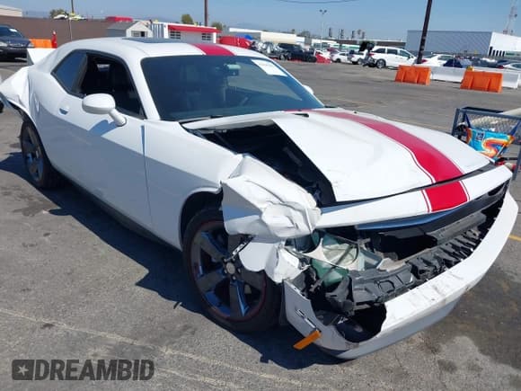 ✅ 2013 Dodge Challenger Rallye Redline • VIN: 2C3CDYAG4DH552070 • Lot: 42945982. Wystawiony na IAAI z przebiegiem Nie podano. Bezpłatny archiwum sprzedaży aukcyjnych z USA i szczegółowy raport historii pojazdu na DreamBid. Zdjęcie 1.