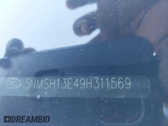 ✅ 2009 Hyundai Santa Fe Limited • VIN: 5NMSH13E49H311569 • Lot: 43738709. Listed on IAAI with 242,215 mi. Free auction sales archive from the USA and detailed vehicle history report at DreamBid. Image 9.