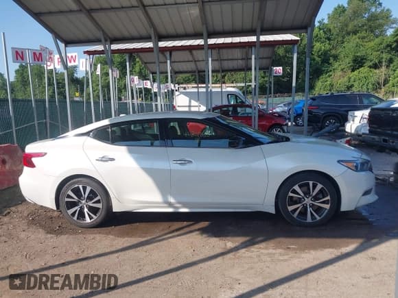 ✅ 2016 Nissan Maxima SR • VIN: 1N4AA6AP9GC390031 • Lot: 42801765. Wystawiony na IAAI z przebiegiem 104 722 mil. Bezpłatny archiwum sprzedaży aukcyjnych z USA i szczegółowy raport historii pojazdu na DreamBid. Zdjęcie 13.