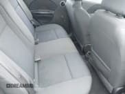 ✅ 2007 Chevrolet Aveo LS • VIN: KL1TD66647B748899 • Lot: 41126412. Wystawiony na IAAI z przebiegiem 124 187 mil. Bezpłatny archiwum sprzedaży aukcyjnych z USA i szczegółowy raport historii pojazdu na DreamBid. Zdjęcie 8.