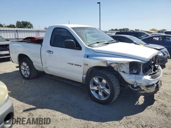 2007 Dodge 1500 SLT with VIN 1D7HA16217J521107, listed as a Copart auction lot 63311714 with 162,428 mi miles and Salvage title. Bid and sale history available at DreamBid. Image 4.