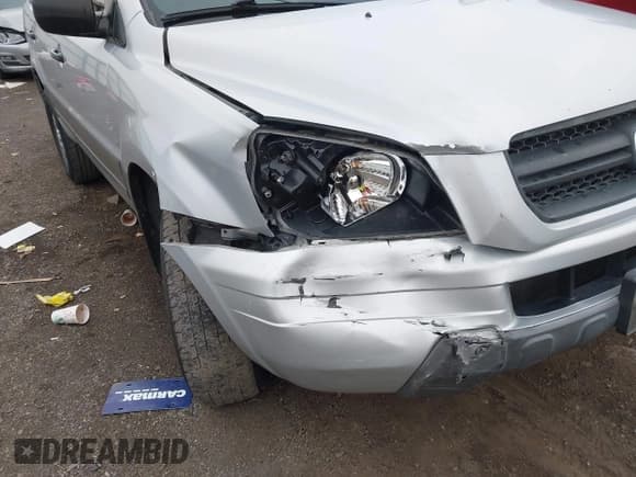 ✅ 2004 Honda Pilot LX • VIN: 2HKYF18114H524383 • Lot: 43581443. Wystawiony na IAAI z przebiegiem 195 983 mil. Bezpłatny archiwum sprzedaży aukcyjnych z USA i szczegółowy raport historii pojazdu na DreamBid. Zdjęcie 6.