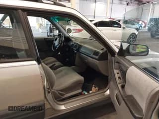 ✅ 2002 Subaru Forester L • VIN: JF1SF63562H754466 • Lot: 43464043. Listed on IAAI with 210,284 mi. Free auction sales archive from the USA and detailed vehicle history report at DreamBid. Image 5.