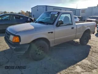 ✅ 1997 Ford Ranger XLT • VIN: 1FTCR10AXVPA26640 • Lot: 94821645. Wystawiony na Copart z przebiegiem 143 528 mil. Bezpłatny archiwum sprzedaży aukcyjnych z USA i szczegółowy raport historii pojazdu na DreamBid. Zdjęcie 1.