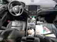 2021 Jeep Grand Cherokee 80th Anniversary z VIN 1C4RJFBG1MC810453, wystawiony jako Copart lot #81626215 z przebiegiem Nie podano mil oraz Szkoda całkowita • Salvage title. Historia ofert i sprzedaży dostępna na DreamBid. Obrazek 8.