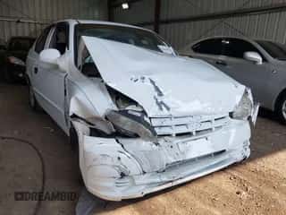 2004 Hyundai Accent GL z VIN KMHCG35C64U306062, wystawiony jako IAAI lot #42685736 z przebiegiem 150 574 mil mil oraz . Historia ofert i sprzedaży dostępna na DreamBid. Obrazek 6.