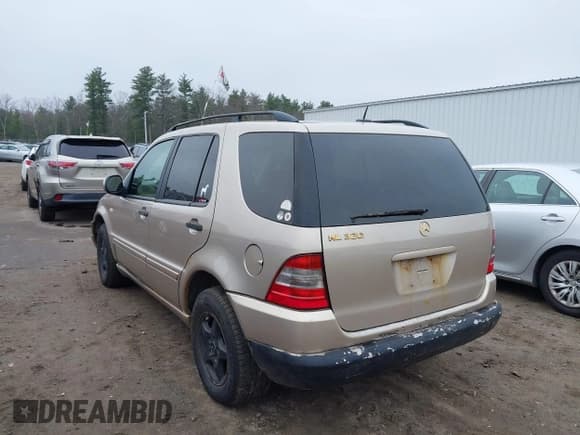 ✅ 2001 Mercedes-Benz M 320/430/500 • VIN: 4JGAB54E81A239191 • Lot: 43758070. Listed on IAAI with 209,752 mi. Free auction sales archive from the USA and detailed vehicle history report at DreamBid. Image 3.