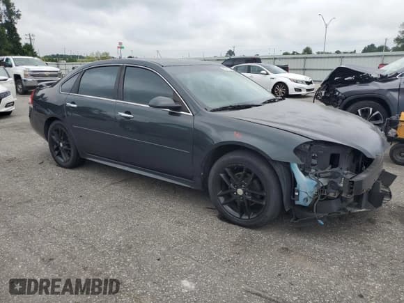 ✅ 2014 Chevrolet Impala LTZ • VIN: 2G1WC5E37E1188960 • Lot: 68081765. Listed on Copart with 87,177 mi. Free auction sales archive from the USA and detailed vehicle history report at DreamBid. Image 4.
