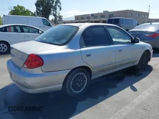 ✅ 2003 Kia Spectra • VIN: KNAFB121235258377 • Лот: 42146691. Опубликован ранее на IAAI с пробегом 174 992 миль. Бесплатный доступ к архиву аукционных продаж из США и подробный отчёт об истории автомобиля на DreamBid. Изображение 4.