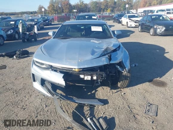 ✅ 2018 Chevrolet Camaro 1LT • VIN: 1G1FB1RX9J0139113 • Lot: 43503039. Listed on IAAI with 119,841 mi. Free auction sales archive from the USA and detailed vehicle history report at DreamBid. Image 12.