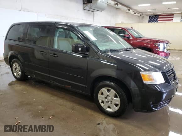 2010 Dodge Grand Caravan SE with VIN 2D4RN4DE6AR107716, listed as a Copart auction lot 42819605 with 253,735 mi miles and Clean title. Bid and sale history available at DreamBid. Image 4.