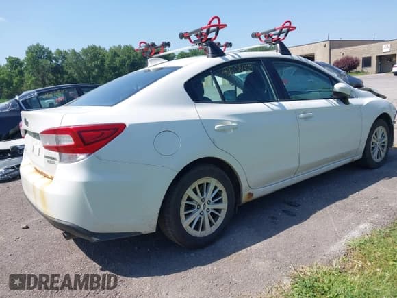 ✅ 2017 Subaru Impreza Premium • VIN: 4S3GKAB64H3614740 • Lot: 42568465. Listed on IAAI with 166,340 mi. Free auction sales archive from the USA and detailed vehicle history report at DreamBid. Image 4.