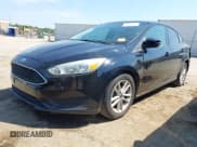 ✅ 2018 Ford Focus SE • VIN: 1FADP3FE8JL281651 • Lot: 43169650. Listed on IAAI with 69,451 mi. Free auction sales archive from the USA and detailed vehicle history report at DreamBid. Image 18.