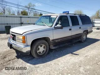 ✅ 1997 GMC Suburban • VIN: 1GKEC16R8VJ746789 • Лот: 52047735. Опубликован ранее на Copart с пробегом 208 732 миль. Бесплатный доступ к архиву аукционных продаж из США и подробный отчёт об истории автомобиля на DreamBid. Изображение 1.