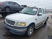 ✅ 1999 Ford F-150 XL • VIN: 1FTRX17L7XKA63863 • Lot: 43629425. Listed on IAAI with 86,931 mi. Free auction sales archive from the USA and detailed vehicle history report at DreamBid. Image 2.