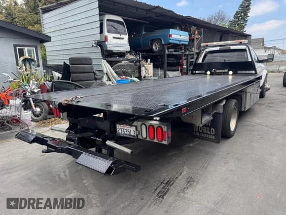 ✅ 2022 Ram 5500 Tradesman • VIN: 3C7WRNDL2NG103315 • Lot: 59128405. Listed on Copart with 125,574 mi. Free auction sales archive from the USA and detailed vehicle history report at DreamBid. Image 4.