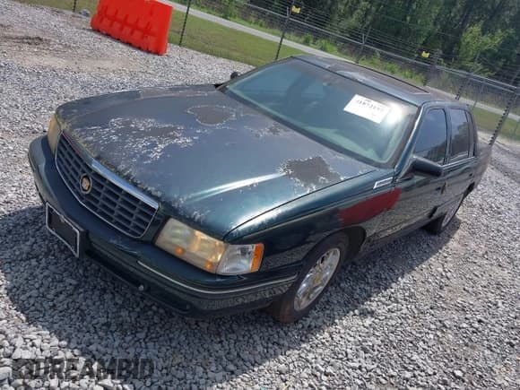 ✅ 1999 Cadillac DeVille • VIN: 1G6KF5498XU761779 • Lot: 41872157. Listed on IAAI with 107,639 mi. Free auction sales archive from the USA and detailed vehicle history report at DreamBid. Image 2.