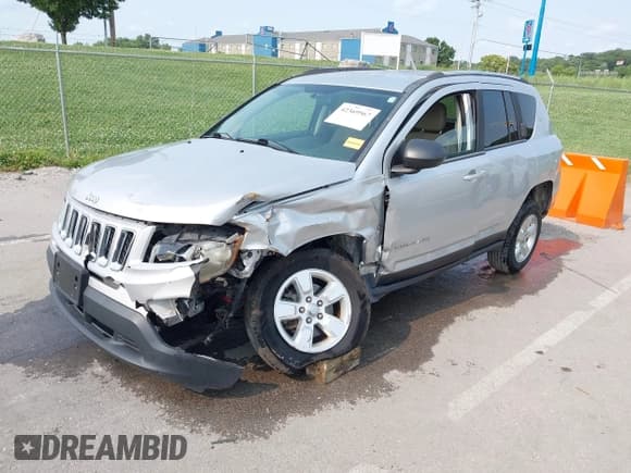✅ 2014 Jeep Compass Sport • VIN: 1C4NJCBAXED523634 • Lot: 42369567. Listed on IAAI with 130,015 mi. Free auction sales archive from the USA and detailed vehicle history report at DreamBid. Image 2.