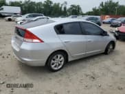 ✅ 2010 Honda Insight EX • VIN: JHMZE2H77AS029960 • Lot: 67789415. Listed on Copart with 194,999 mi. Free auction sales archive from the USA and detailed vehicle history report at DreamBid. Image 3.