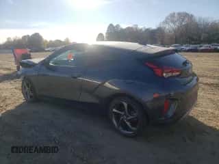 2019 Hyundai Veloster Premium с VIN KMHTG6AF8KU013178, выставлен на аукционе Copart как лот 84291964 с пробегом 79 367 миль миль и Списание • Salvage title. История ставок и продаж доступна на DreamBid. Изображение 2.