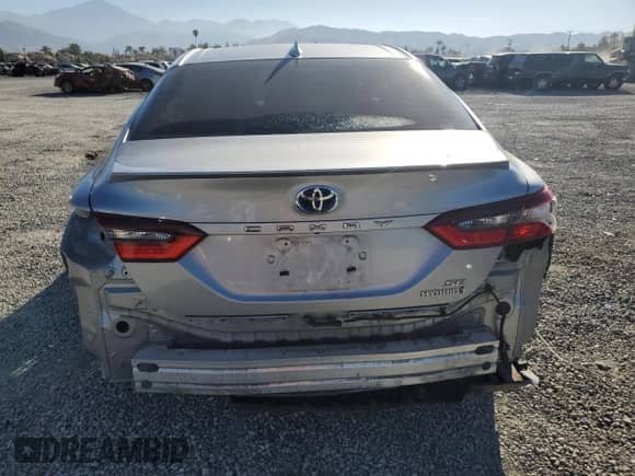 2021 Toyota Camry Hybrid SE с VIN 4T1G31AK7MU556263, выставлен на аукционе Copart как лот 84229075 с пробегом 104 650 миль миль и Списание • Salvage title. История ставок и продаж доступна на DreamBid. Изображение 6.