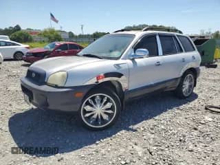 2001 Hyundai Santa Fe GLS z VIN KM8SC83D31U029432, wystawiony jako Copart lot #70366715 z przebiegiem Nie podano mil oraz Szkoda całkowita • Salvage title. Historia ofert i sprzedaży dostępna na DreamBid. Obrazek 1.
