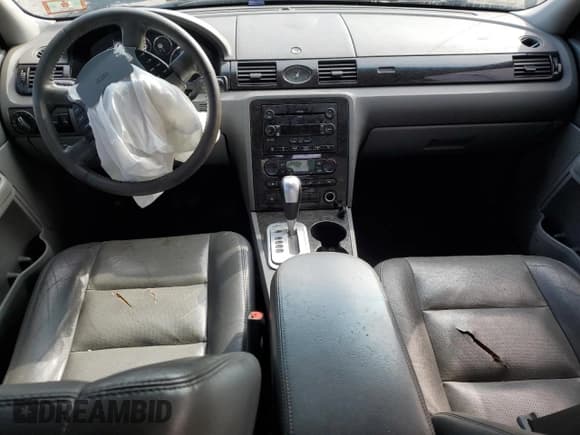 ✅ 2005 Mercury Montego Premier • VIN: 1MEFM42135G623041 • Лот: 64746205. Опубликован ранее на Copart с пробегом Не указан. Бесплатный доступ к архиву аукционных продаж из США и подробный отчёт об истории автомобиля на DreamBid. Изображение 8.