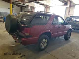 2003 Chevrolet Blazer LS z VIN 1GNCT18X13K165163, wystawiony jako Copart lot #78693034 z przebiegiem 159 770 mil mil oraz Szkoda całkowita • Salvage title. Historia ofert i sprzedaży dostępna na DreamBid. Obrazek 3.