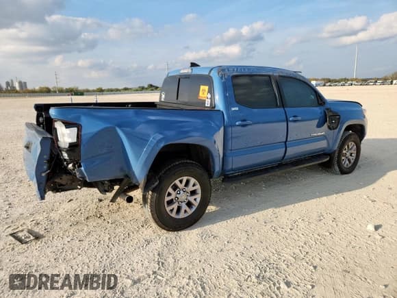 ✅ 2019 Toyota Tacoma SR5 • VIN: 5TFAZ5CN0KX073779 • Lot: 93379175. Listed on Copart with 129,927 mi. Free auction sales archive from the USA and detailed vehicle history report at DreamBid. Image 3.