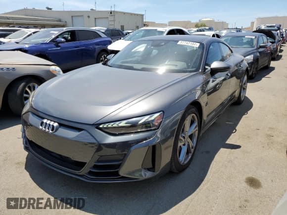 ✅ 2022 Audi e-tron GT Prestige • VIN: WAUDJBFW9N7004503 • Лот: 57742104. Опубликован ранее на Copart с пробегом 27 457 миль. Бесплатный доступ к архиву аукционных продаж из США и подробный отчёт об истории автомобиля на DreamBid. Изображение 1.