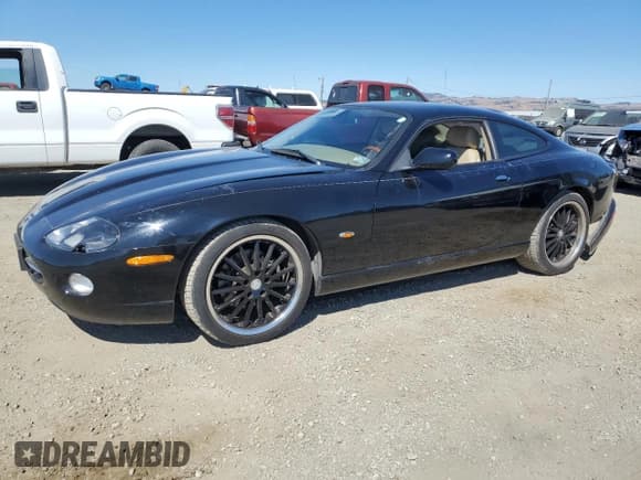 ✅ 2005 Jaguar XK • VIN: SAJDA41C152A43910 • Лот: 70783124. Опубликован ранее на Copart с пробегом 83 654 миль. Бесплатный доступ к архиву аукционных продаж из США и подробный отчёт об истории автомобиля на DreamBid. Изображение 1.