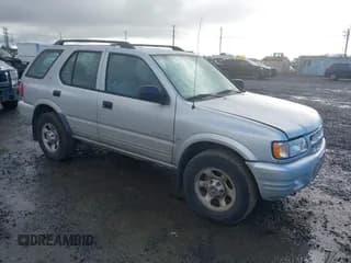 ✅ 2000 Isuzu Rodeo • VIN: 4S2DM58W9Y4301998 • Лот: 41265011. Опубликован ранее на IAAI с пробегом 222 659 миль. Бесплатный доступ к архиву аукционных продаж из США и подробный отчёт об истории автомобиля на DreamBid. Изображение 1.