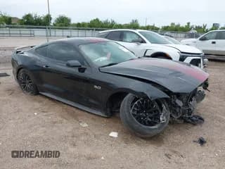 ✅ 2020 Ford Mustang GT • VIN: 1FA6P8CF0L5146450 • Lot: 42899310. Listed on IAAI with 33,502 mi. Free auction sales archive from the USA and detailed vehicle history report at DreamBid. Image 1.