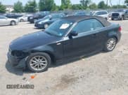 ✅ 2010 BMW 1 Series 128i • VIN: WBAUN1C55AVH81750 • Lot: 42411484. Listed on IAAI with 124,432 mi. Free auction sales archive from the USA and detailed vehicle history report at DreamBid. Image 2.