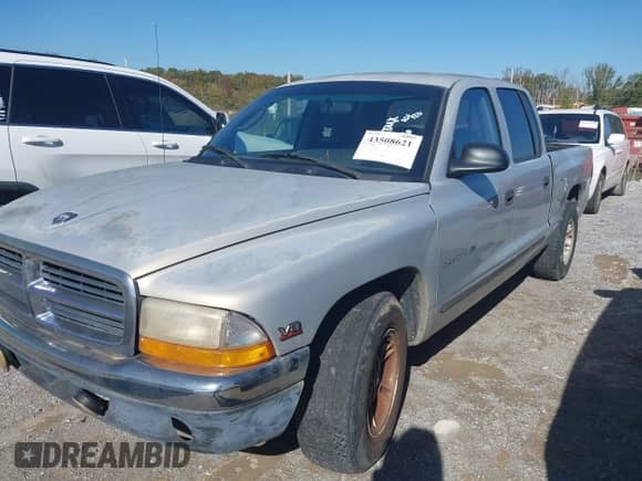 ✅ 2000 Dodge Dakota Sport • VIN: 1B7GL2AN6YS671636 • Лот: 43508621. Размещён на IAAI с пробегом 243 999 миль миль. Получите бесплатный доступ к архиву аукционных продаж из США и посмотрите подробный отчёт об истории автомобиля на DreamBid. Изображение 2.