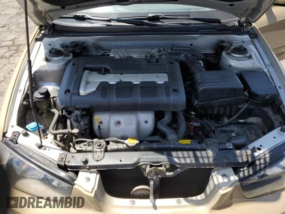 2002 Hyundai Elantra GLS z VIN KMHDN45DX2U429546, wystawiony jako Copart lot #66802244 z przebiegiem 103 724 mil mil oraz Czysty tytuł • Clean title. Historia ofert i sprzedaży dostępna na DreamBid. Obrazek 11.