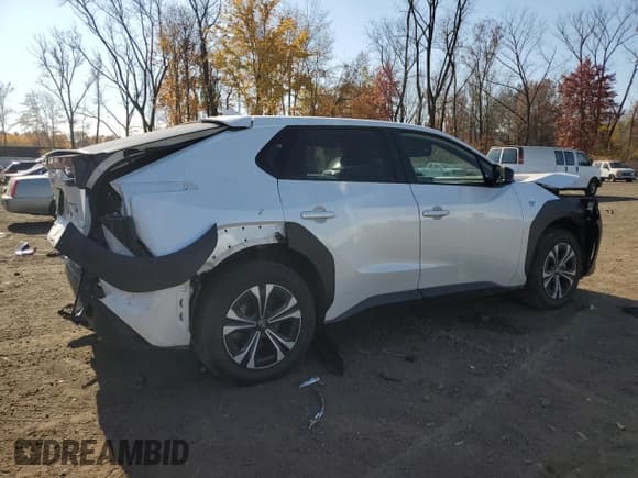 ✅ 2023 Subaru Solterra Premium • VIN: JTMABABAXPA024577 • Lot: 77157704. Listed on Copart with 11,939 mi. Free auction sales archive from the USA and detailed vehicle history report at DreamBid. Image 3.