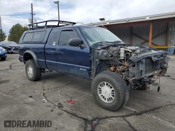 ✅ 2003 Chevrolet S-10 LS • VIN: 1GCCT19X238158338 • Lot: 86185115. Listed on Copart with 219,896 mi. Free auction sales archive from the USA and detailed vehicle history report at DreamBid. Image 4.