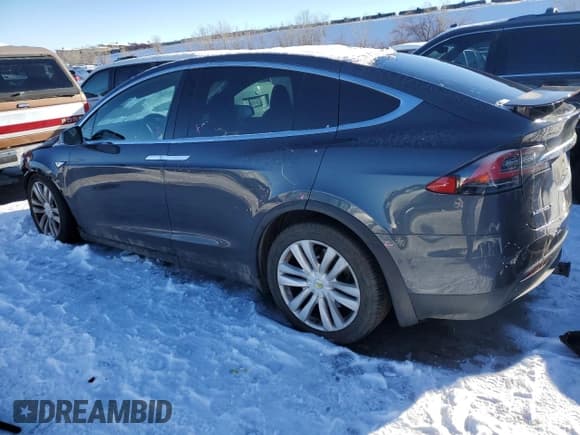 ✅ 2016 Tesla Model X 70D • VIN: 5YJXCAE25GF015871 • Лот: 72473452. Опубликован ранее на Copart с пробегом 98 945 миль. Бесплатный доступ к архиву аукционных продаж из США и подробный отчёт об истории автомобиля на DreamBid. Изображение 2.