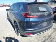 ✅ 2020 Honda CR-V EX-L • VIN: 2HKRW1H8XLH415825 • Lot: 43697303. Listed on IAAI with 128,863 mi. Free auction sales archive from the USA and detailed vehicle history report at DreamBid. Image 3.