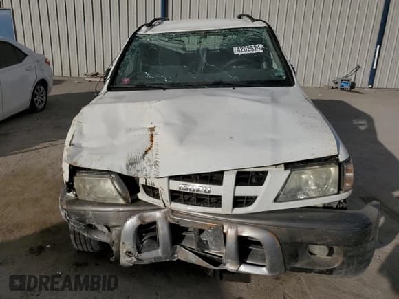 ✅ 2004 Isuzu Rodeo S • VIN: 4S2CK58Y244309017 • Lot: 83303294. Listed on Copart with 121,723 mi. Free auction sales archive from the USA and detailed vehicle history report at DreamBid. Image 5.