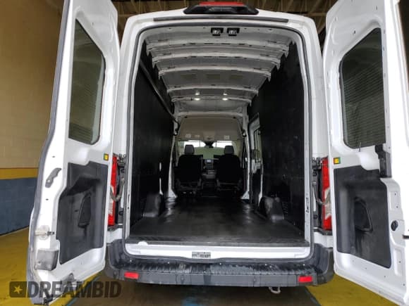 ✅ 2023 Ford Transit Cargo • VIN: 1FTBR3X8XPKA82734 • Lot: 57962415. Listed on Copart with 53,505 mi. Free auction sales archive from the USA and detailed vehicle history report at DreamBid. Image 10.