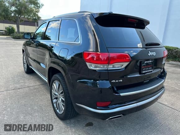 ✅ 2018 Jeep Grand Cherokee Summit • VIN: 1C4RJFJG4JC218011 • Lot: 91515965. Listed on Copart with 140,761 mi. Free auction sales archive from the USA and detailed vehicle history report at DreamBid. Image 3.