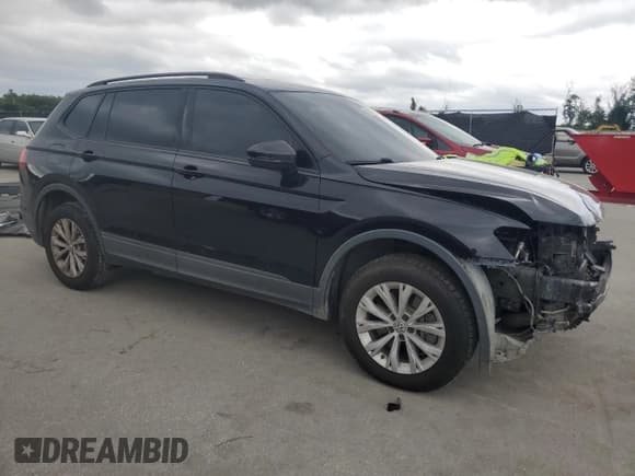 ✅ 2020 Volkswagen Tiguan S • VIN: 3VV1B7AXXLM025428 • Lot: 84573315. Listed on Copart with 159,777 mi. Free auction sales archive from the USA and detailed vehicle history report at DreamBid. Image 4.