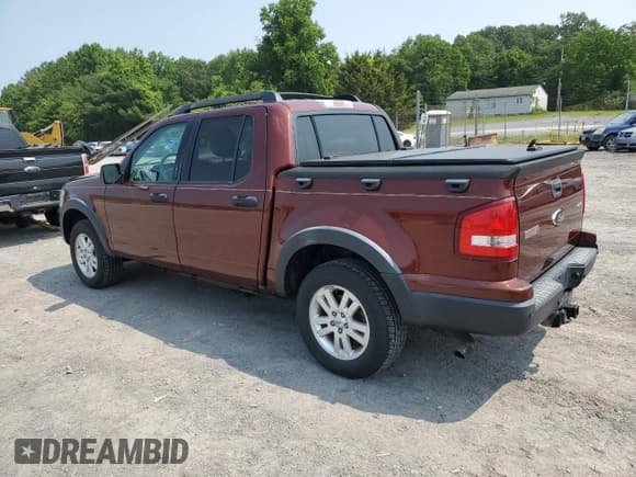 ✅ 2010 Ford Explorer Sport Trac XLT • VIN: 1FMEU5BE6AUA41397 • Лот: 60508925. Опубликован ранее на Copart с пробегом 167 500 миль. Бесплатный доступ к архиву аукционных продаж из США и подробный отчёт об истории автомобиля на DreamBid. Изображение 2.