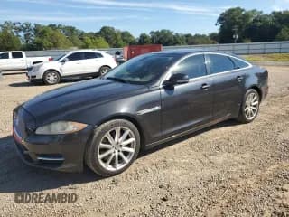 ✅ 2011 Jaguar XJ • VIN: SAJWA1CB1BLV14534 • Lot: 84414885. Listed on Copart with 152,841 mi. Free auction sales archive from the USA and detailed vehicle history report at DreamBid. Image 1.